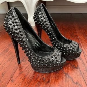 Gorgeous Steve Madden black spiked pumps.